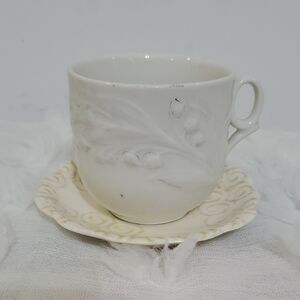 Elegant White Embossed Teacup and Saucer Set